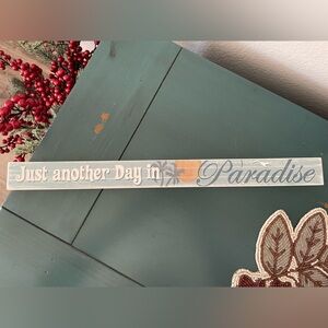 "Just Another Day In Paradise" sign